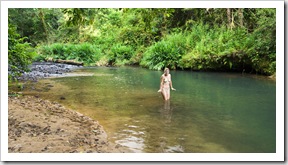 Lisa hopping into an icy Bush Pool swimming hole near our Henrietta Creek campsite