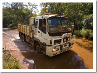 Trucks tackling the water crossings on Battle Camp Road