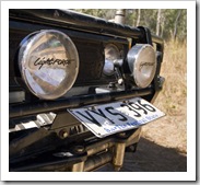 Bent license plate after a big bow wave through one of the water crossings