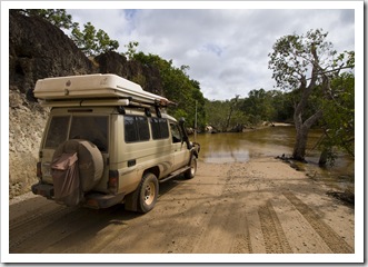 Tackling some deeper water across the Pascoe River on the way into Iron Range National Park