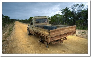 Abandoned LandCruiser with a broken axle in Iron Range National Park