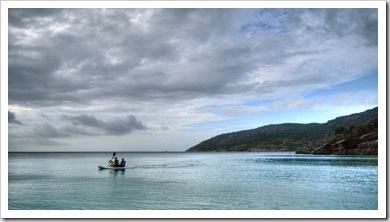 Jenni and Lisa paddling the waters of Anchor Bay