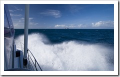 Rough seas on the way to the outer reef with North Direction Island in the distance