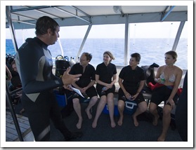 Jenni and Lisa being briefed by Scott before diving at Cod Hole