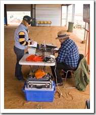 Lisa placing a bet at the Bedourie camel races