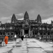 Monk standing at the entrance to Angkor Wat