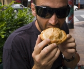 Sam sampling the fare from Pot Belly Pies in Maclean