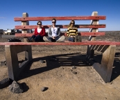 Judy, Todd and Lisa on an oversized bench in Broken Hill